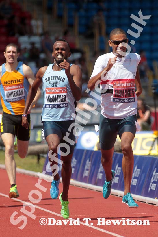 Michael Rimmer dholds off Mukhtar Mohammed to win the 800 metres at the Sainsbury's British Championships, Birmingham.